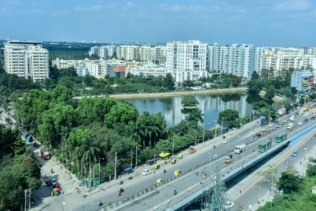 Urban landscape with greenery and water.